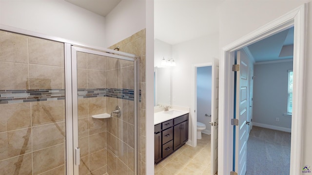 444 Southern Oaks Dr, Macon, GA 31216 - full bathroom featuring toilet, a shower stall, vanity, and baseboards