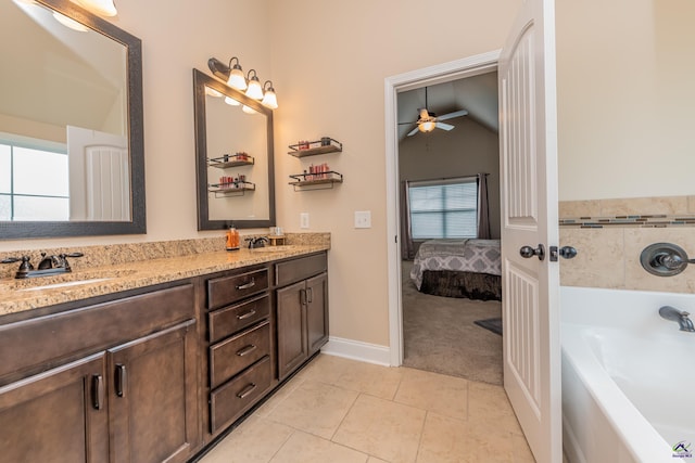 230 Misty Valley Ln, Bonaire, GA 31005 - full bathroom with double vanity, a ceiling fan, a bath, tile patterned flooring, and ensuite bath