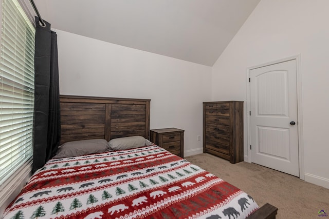 230 Misty Valley Ln, Bonaire, GA 31005 - carpeted bedroom featuring baseboards and high vaulted ceiling