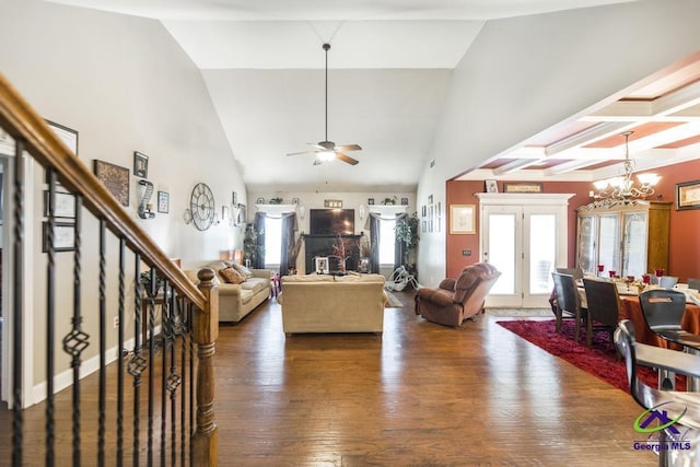 101 Regency Ct, Warner Robins, GA 31088 - living room featuring a chandelier, hardwood / wood-style floors, a ceiling fan, high vaulted ceiling, and stairs
