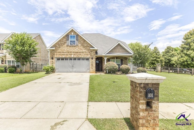 101 Regency Ct, Warner Robins, GA 31088 - craftsman-style house featuring driveway and brick siding