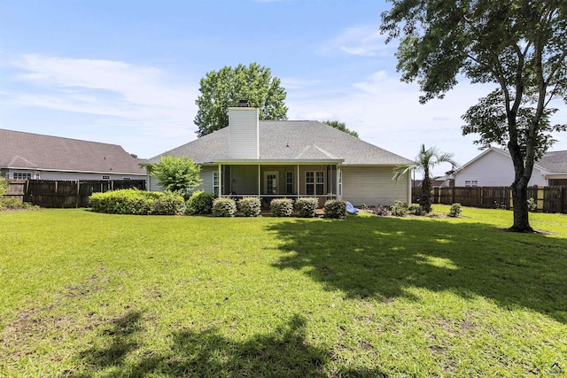 111 Venus Way, Bonaire, GA 31005 - back of house with a chimney