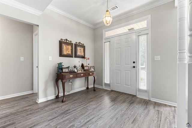 111 Venus Way, Bonaire, GA 31005 - entryway featuring wood finished floors, crown molding, and ornate columns