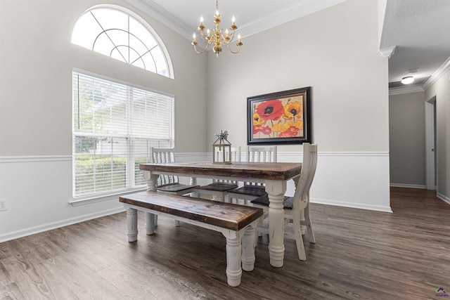 111 Venus Way, Bonaire, GA 31005 - dining room with crown molding, a chandelier, wood finished floors, and plenty of natural light
