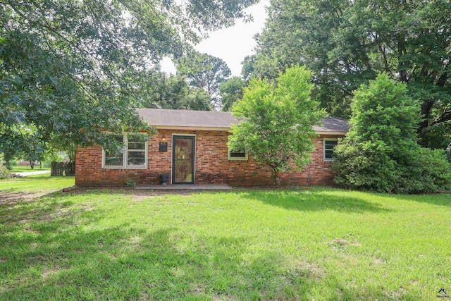 431 Alabama Ave, Warner Robins, GA 31093 - view of front facade with a front lawn and brick siding