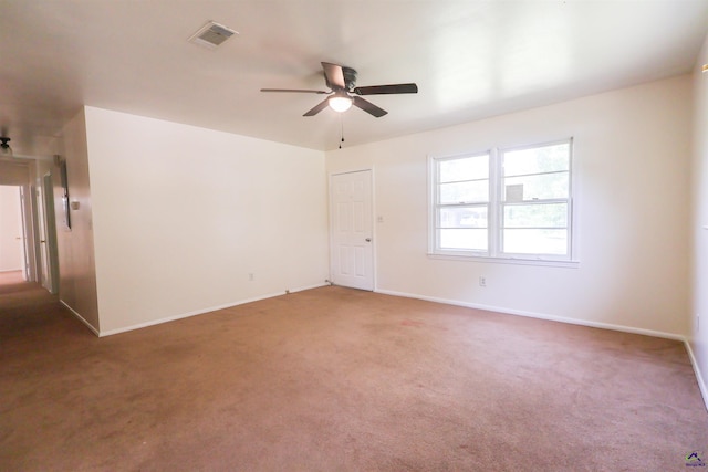 431 Alabama Ave, Warner Robins, GA 31093 - carpeted empty room with ceiling fan and baseboards