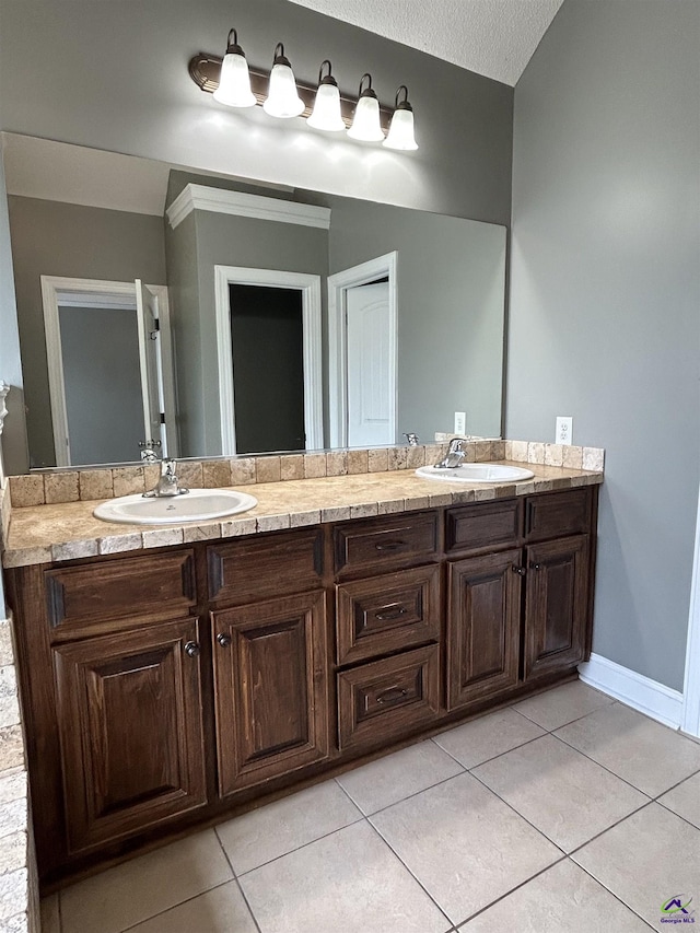 228 Piedmont Ln, Bonaire, GA 31005 - bathroom featuring double vanity and tile patterned flooring