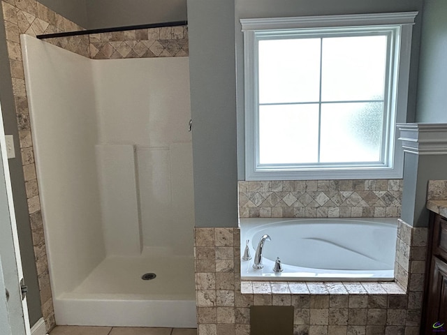 228 Piedmont Ln, Bonaire, GA 31005 - full bathroom with vanity, a bath, and walk in shower