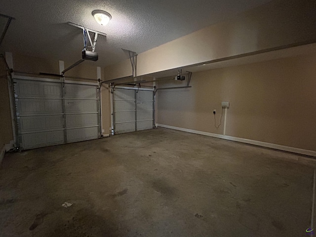 228 Piedmont Ln, Bonaire, GA 31005 - garage featuring a garage door opener