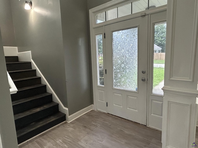 228 Piedmont Ln, Bonaire, GA 31005 - foyer entrance featuring stairs and wood finished floors