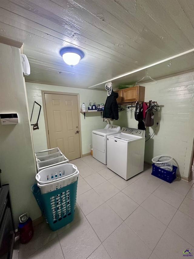 676 N 2nd St, Danville, GA 31017 - laundry room featuring separate washer and dryer, wooden ceiling, and light tile patterned floors