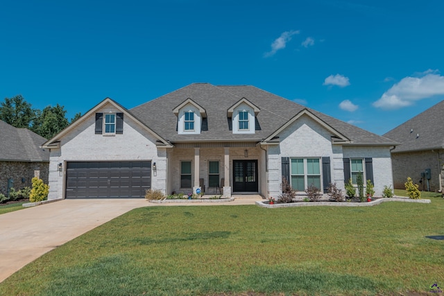 202 Brook Hollow Ct, Kathleen, GA 31047 - view of front of property featuring brick siding, concrete driveway, a front lawn, and a garage