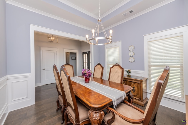 202 Brook Hollow Ct, Kathleen, GA 31047 - dining room with a chandelier, healthy amount of natural light, dark wood finished floors, a wainscoted wall, and crown molding