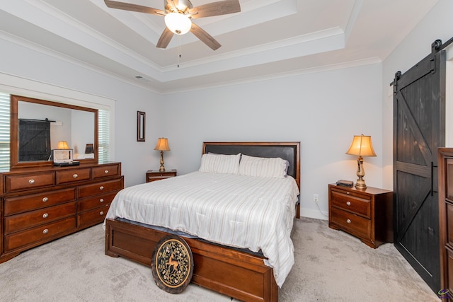 202 Brook Hollow Ct, Kathleen, GA 31047 - bedroom featuring a barn door, light carpet, a raised ceiling, crown molding, and ceiling fan