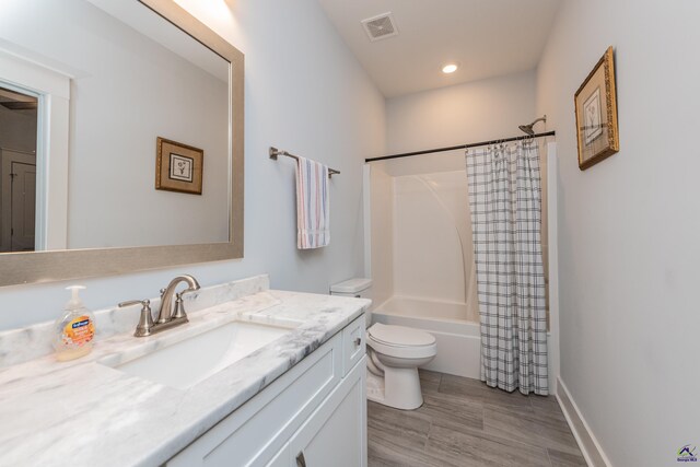 202 Brook Hollow Ct, Kathleen, GA 31047 - full bathroom with vanity, shower / bathtub combination with curtain, wood finished floors, and recessed lighting