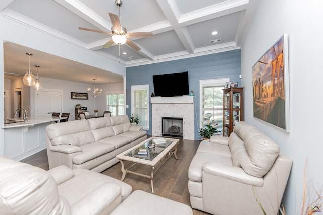 202 Brook Hollow Ct, Kathleen, GA 31047 - living area featuring dark wood-type flooring, a ceiling fan, coffered ceiling, beam ceiling, and a chandelier