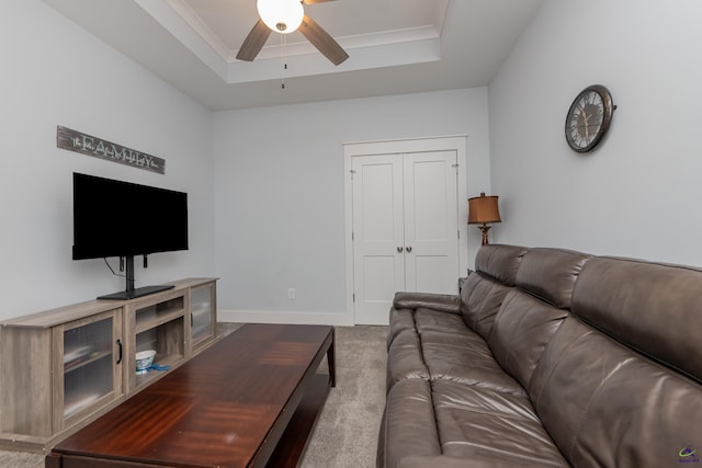 202 Brook Hollow Ct, Kathleen, GA 31047 - living room featuring carpet floors, a ceiling fan, and a tray ceiling