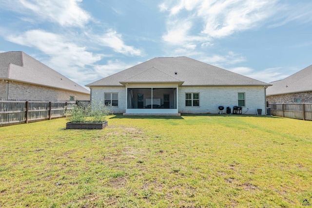 202 Brook Hollow Ct, Kathleen, GA 31047 - rear view of house with a fenced backyard and a sunroom