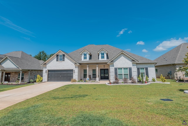202 Brook Hollow Ct, Kathleen, GA 31047 - view of front facade with brick siding, driveway, a front lawn, and roof with shingles