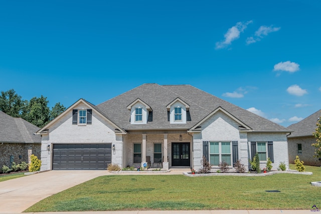 202 Brook Hollow Ct, Kathleen, GA 31047 - view of front of property with brick siding, driveway, a front lawn, and a shingled roof