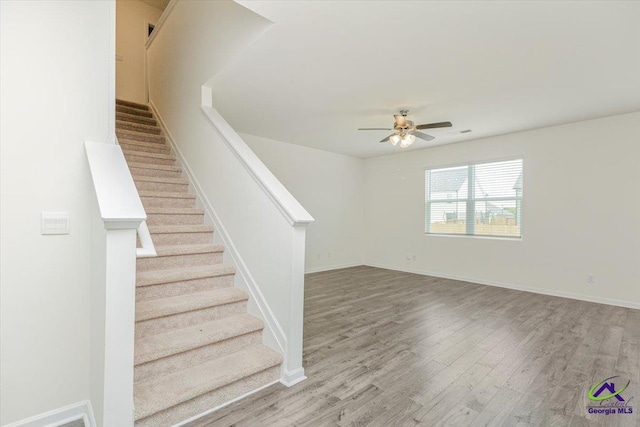 111 Farmers Way, Perry, GA 31069 - stairway with wood finished floors and ceiling fan