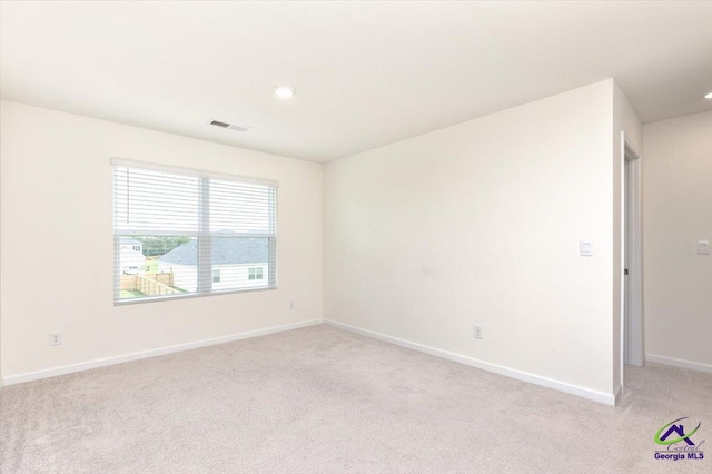 111 Farmers Way, Perry, GA 31069 - empty room featuring light carpet and recessed lighting