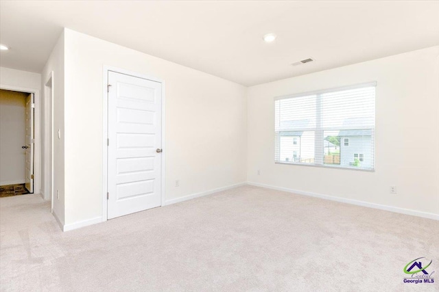 111 Farmers Way, Perry, GA 31069 - empty room featuring light colored carpet and recessed lighting