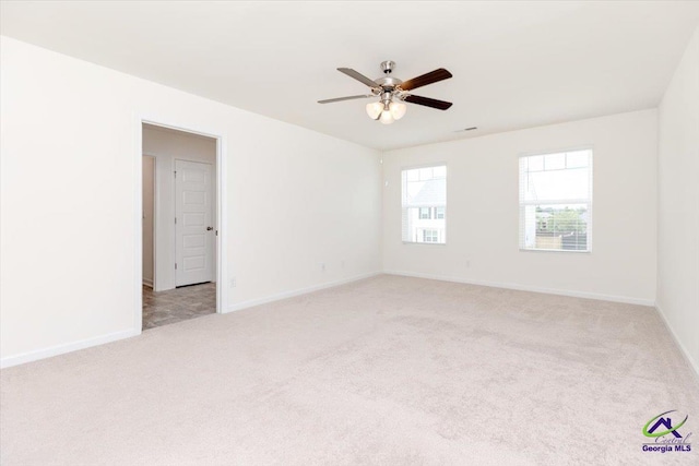 111 Farmers Way, Perry, GA 31069 - spare room featuring light colored carpet and ceiling fan