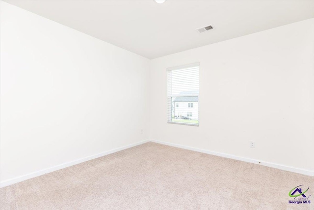 111 Farmers Way, Perry, GA 31069 - spare room featuring light carpet and baseboards