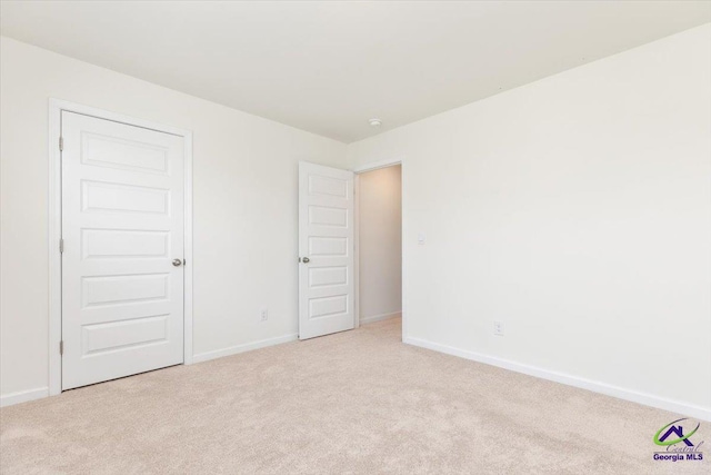 111 Farmers Way, Perry, GA 31069 - unfurnished bedroom with light carpet