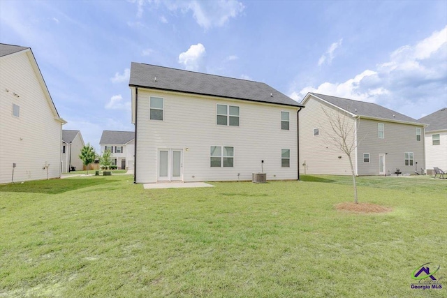 111 Farmers Way, Perry, GA 31069 - back of house with a yard and a patio