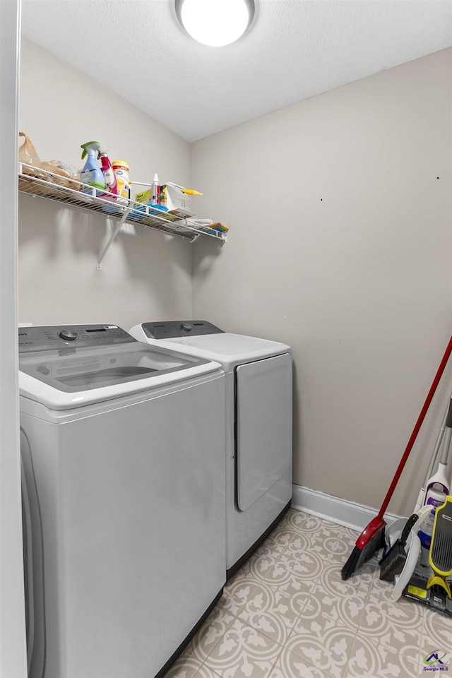 304 Kendall Ct, Perry, GA 31069 - laundry room with washing machine and dryer and baseboards