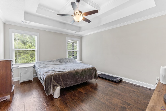 304 Kendall Ct, Perry, GA 31069 - bedroom with a raised ceiling, dark wood finished floors, ornamental molding, and ceiling fan