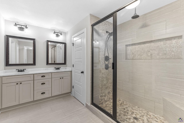 304 Kendall Ct, Perry, GA 31069 - full bathroom with a shower stall and double vanity