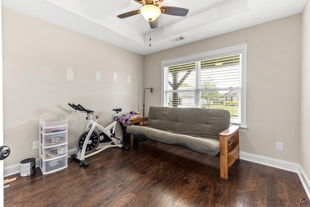 304 Kendall Ct, Perry, GA 31069 - workout room with a raised ceiling, ceiling fan, and wood finished floors