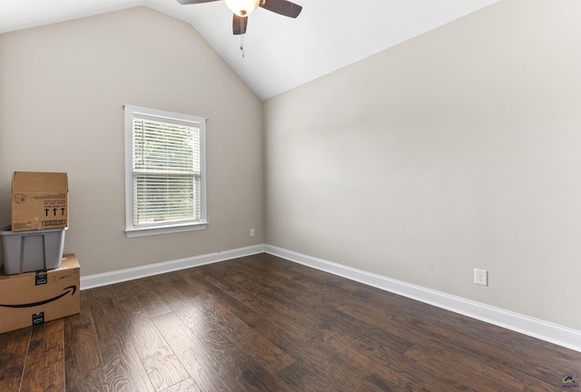 304 Kendall Ct, Perry, GA 31069 - empty room with a ceiling fan, dark wood finished floors, and vaulted ceiling