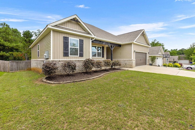 304 Kendall Ct, Perry, GA 31069 - view of front of house with brick siding, driveway, board and batten siding, a garage, and roof with shingles