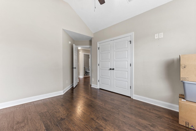 304 Kendall Ct, Perry, GA 31069 - unfurnished bedroom with lofted ceiling, dark wood-type flooring, a ceiling fan, and a closet