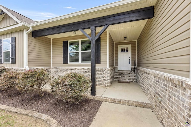 304 Kendall Ct, Perry, GA 31069 - doorway to property featuring brick siding and board and batten siding