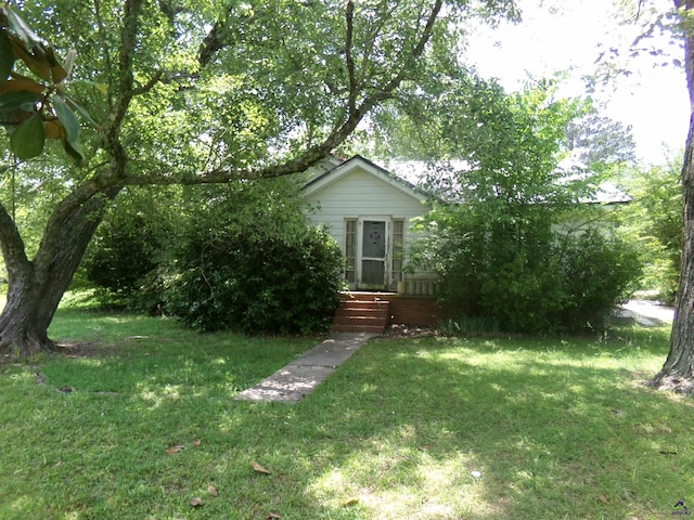 9533 US Highway 80 W, Culloden, GA 31016 - obstructed view of property featuring a front yard