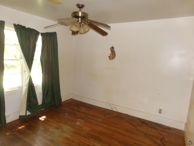 9533 US Highway 80 W, Culloden, GA 31016 - spare room featuring wood finished floors, healthy amount of natural light, and a ceiling fan