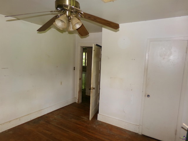 9533 US Highway 80 W, Culloden, GA 31016 - unfurnished bedroom featuring wood finished floors and baseboards