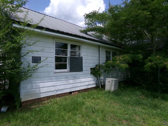 9533 US Highway 80 W, Culloden, GA 31016 - view of home's exterior with a metal roof and crawl space