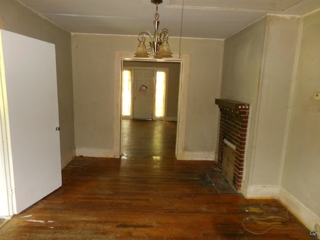 9533 US Highway 80 W, Culloden, GA 31016 - corridor with hardwood / wood-style flooring and a chandelier