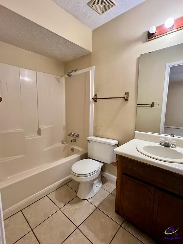 102 Overlook Dr, Warner Robins, GA 31088 - bathroom featuring a textured ceiling, tile patterned flooring, vanity, and shower / tub combination