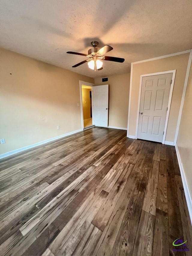 102 Overlook Dr, Warner Robins, GA 31088 - unfurnished bedroom with wood-type flooring, a textured ceiling, and ceiling fan