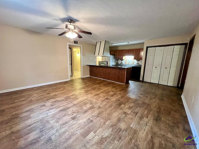 102 Overlook Dr, Warner Robins, GA 31088 - unfurnished living room featuring dark wood finished floors and ceiling fan
