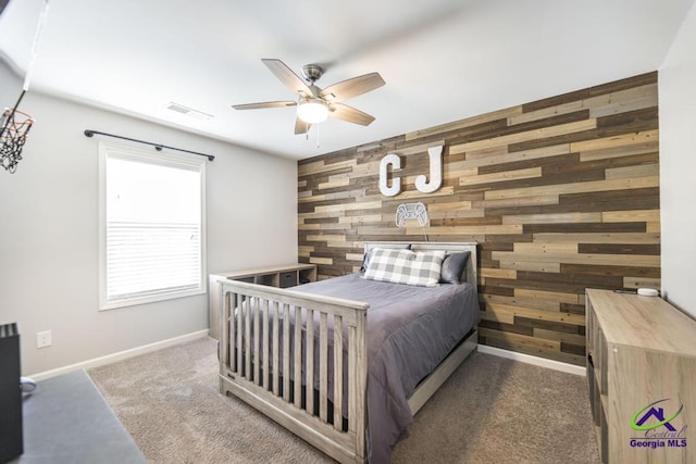 501 Adirondac Way, Bonaire, GA 31005 - bedroom with wood walls, carpet, and a ceiling fan