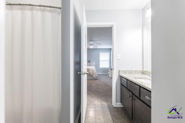 501 Adirondac Way, Bonaire, GA 31005 - bathroom featuring vanity, ensuite bath, tile patterned floors, a ceiling fan, and a shower with curtain