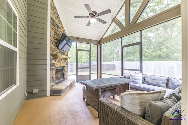 501 Adirondac Way, Bonaire, GA 31005 - sunroom / solarium featuring lofted ceiling, a ceiling fan, an outdoor living space with a fireplace, and healthy amount of natural light